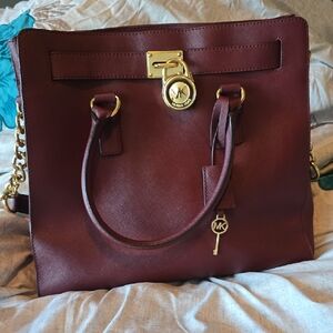 Michael Kors Wine Red Shoulder Bag with Gold Accents